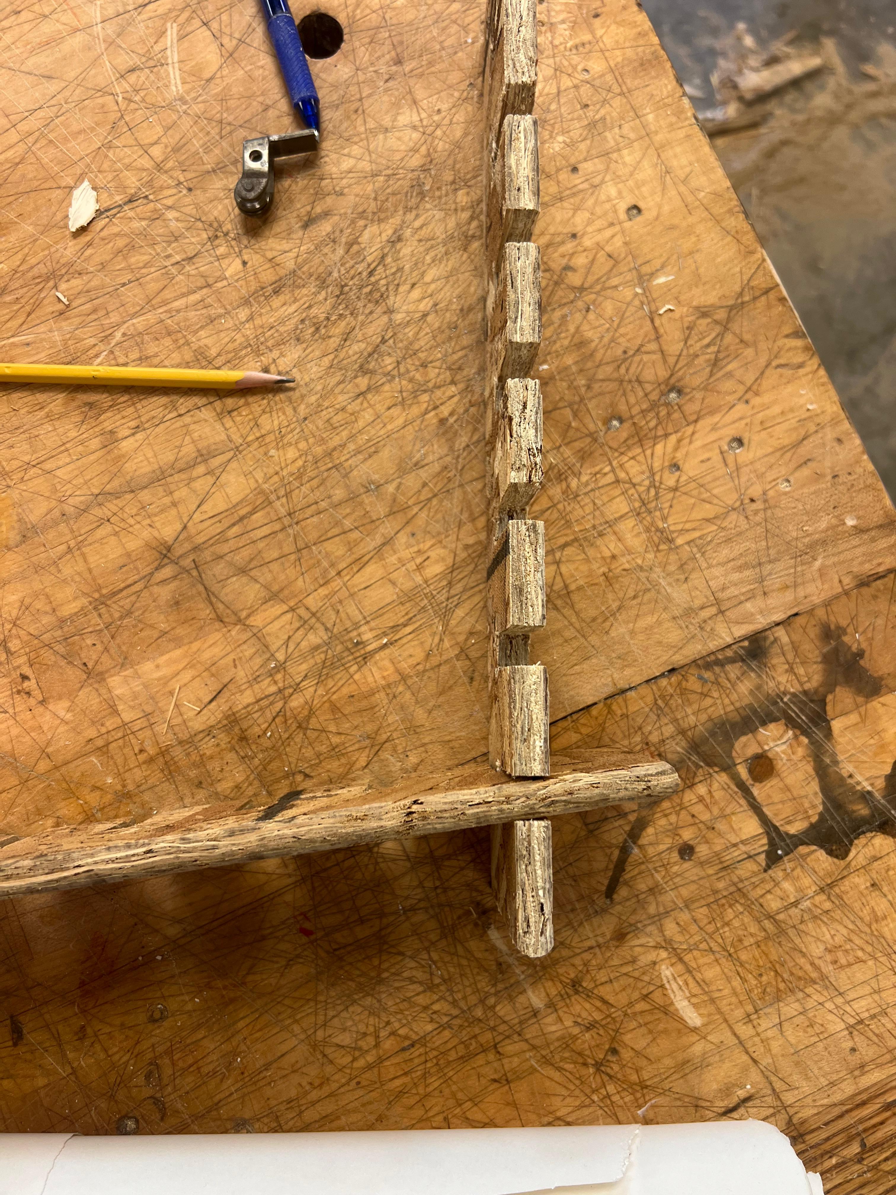 Loose comb showing oversized slots